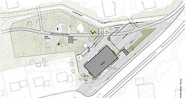 skiss över en tänkt ny förskola i ett parkområde