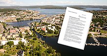 Revisionsberättelsen och en flygbild över Härnösand.