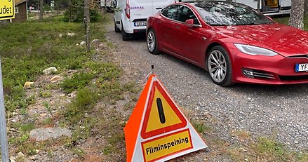 Skylt på en parkering som visar att det pågår en filminspelning