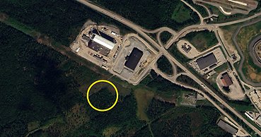 Flygbild över Saltviks industriområde med ett område inringat.
